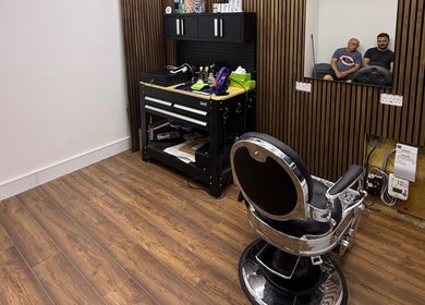 Modern barber station at Stokes Cuts, Broadstairs, England, GB, featuring sleek chair and stylish décor.