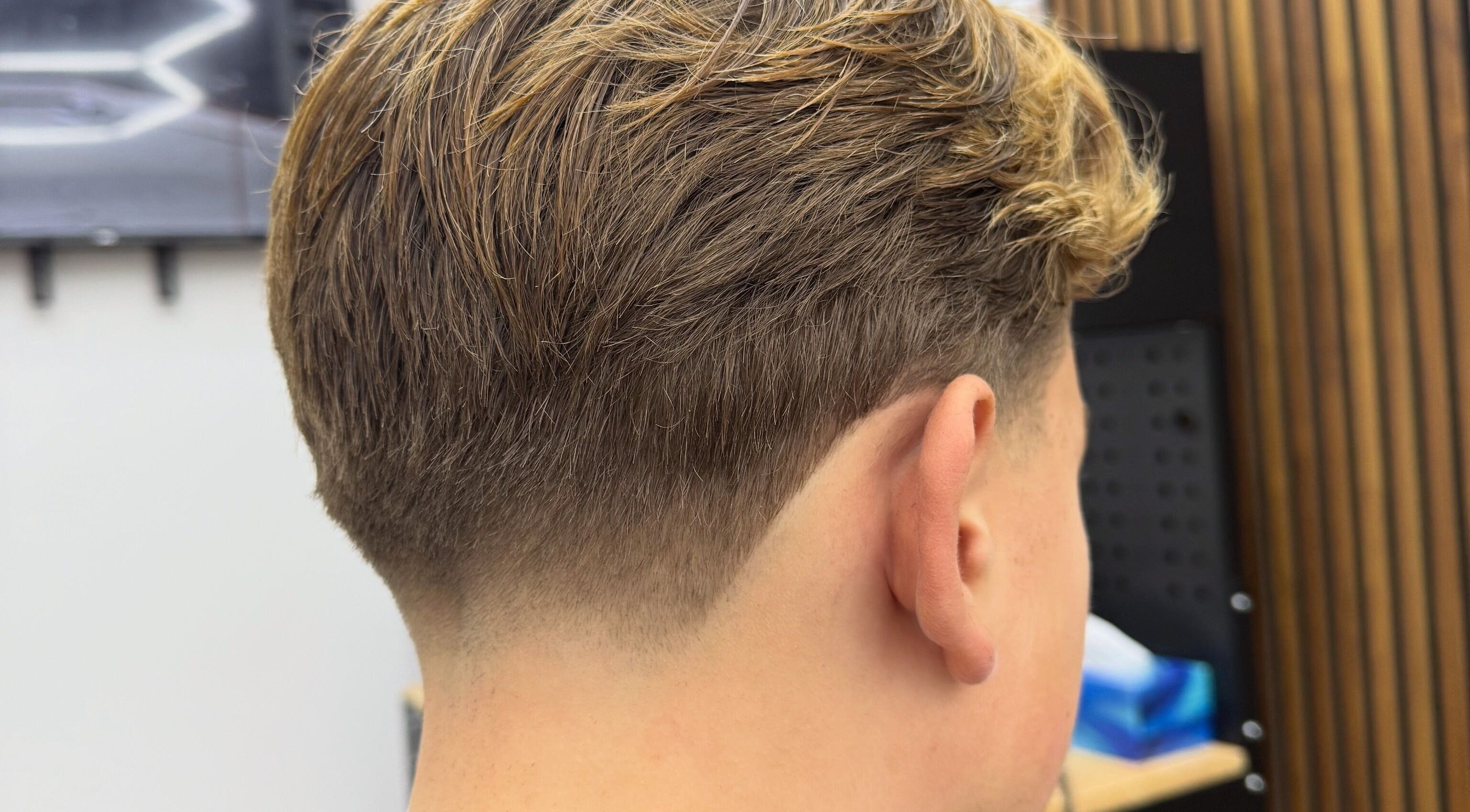Fresh undercut style at Stokes Cuts in Broadstairs, England, GB, showcasing precise barbering skills.