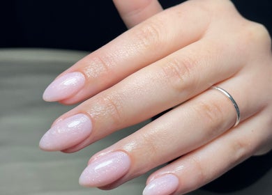Elegant manicure at Lisa’s Nail Nook, Cape Town, Western Cape, ZA. Shimmering nails with a sleek finish.