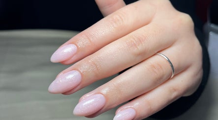 Elegant manicure at Lisa’s Nail Nook, Cape Town, Western Cape, ZA. Shimmering nails with a sleek finish.