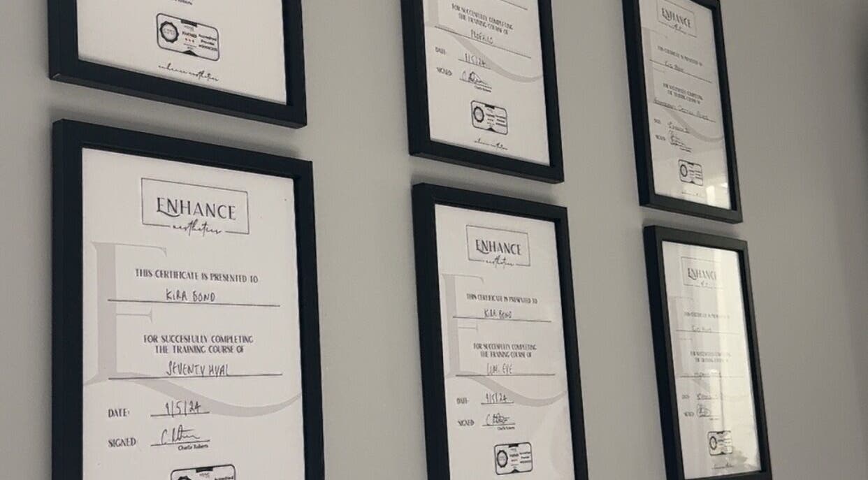 Certificate display at Total Aesthetics Clinic, Wisbech, England, GB showcasing professional credentials.