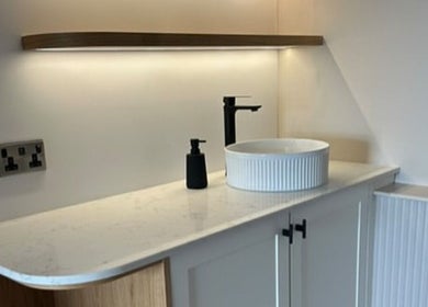 Elegant vanity area at Pause Beauty & Holistic in Chew Magna, England, GB with modern sink and ambient lighting.