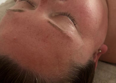 Close-up of a serene face during a facial at Pause Beauty & Holistic, Chew Magna, England, GB.