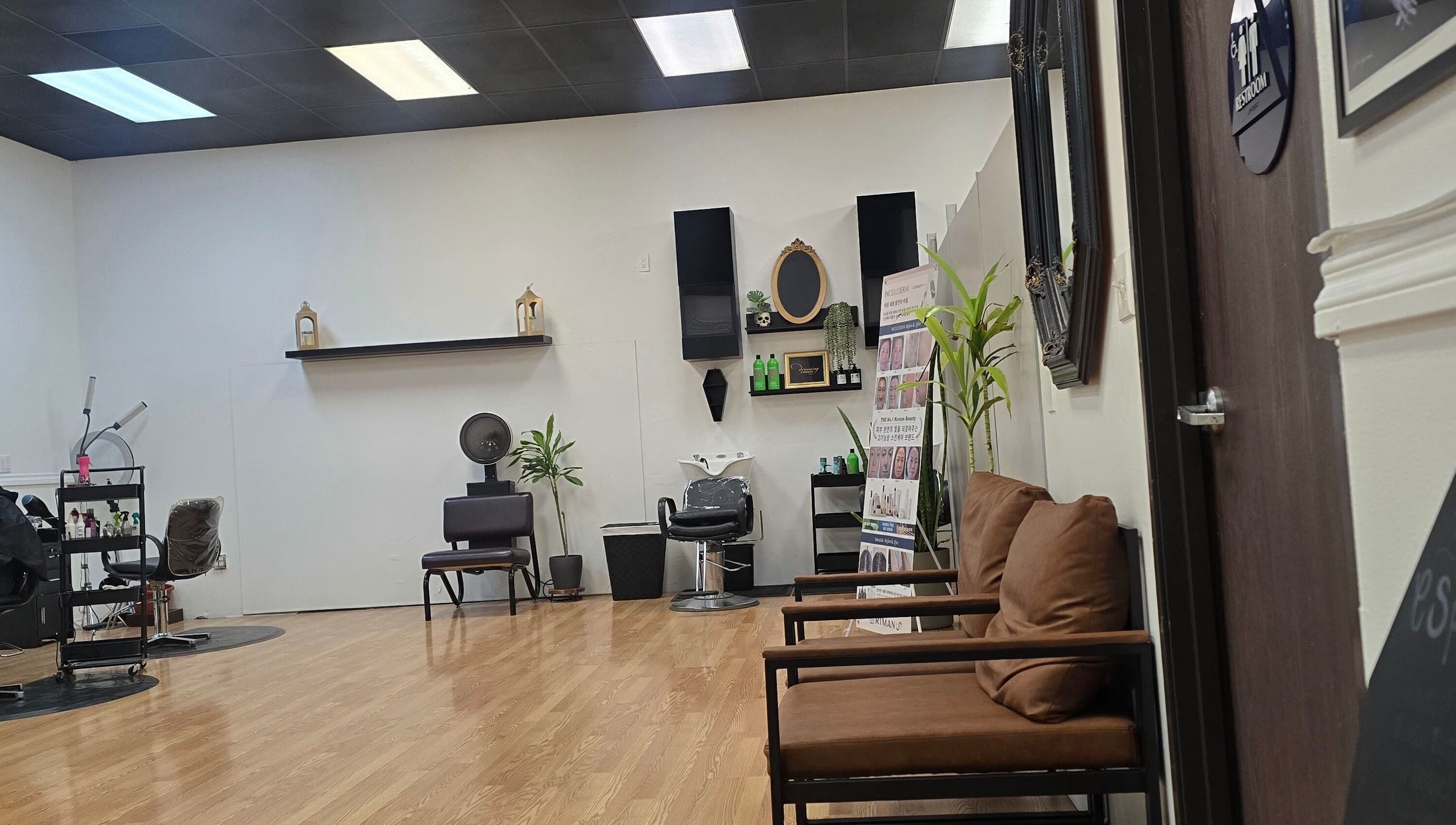 Chic and modern interior of Crystal's Beauty Lab in Paramount, California, US showcasing spacious elegance.