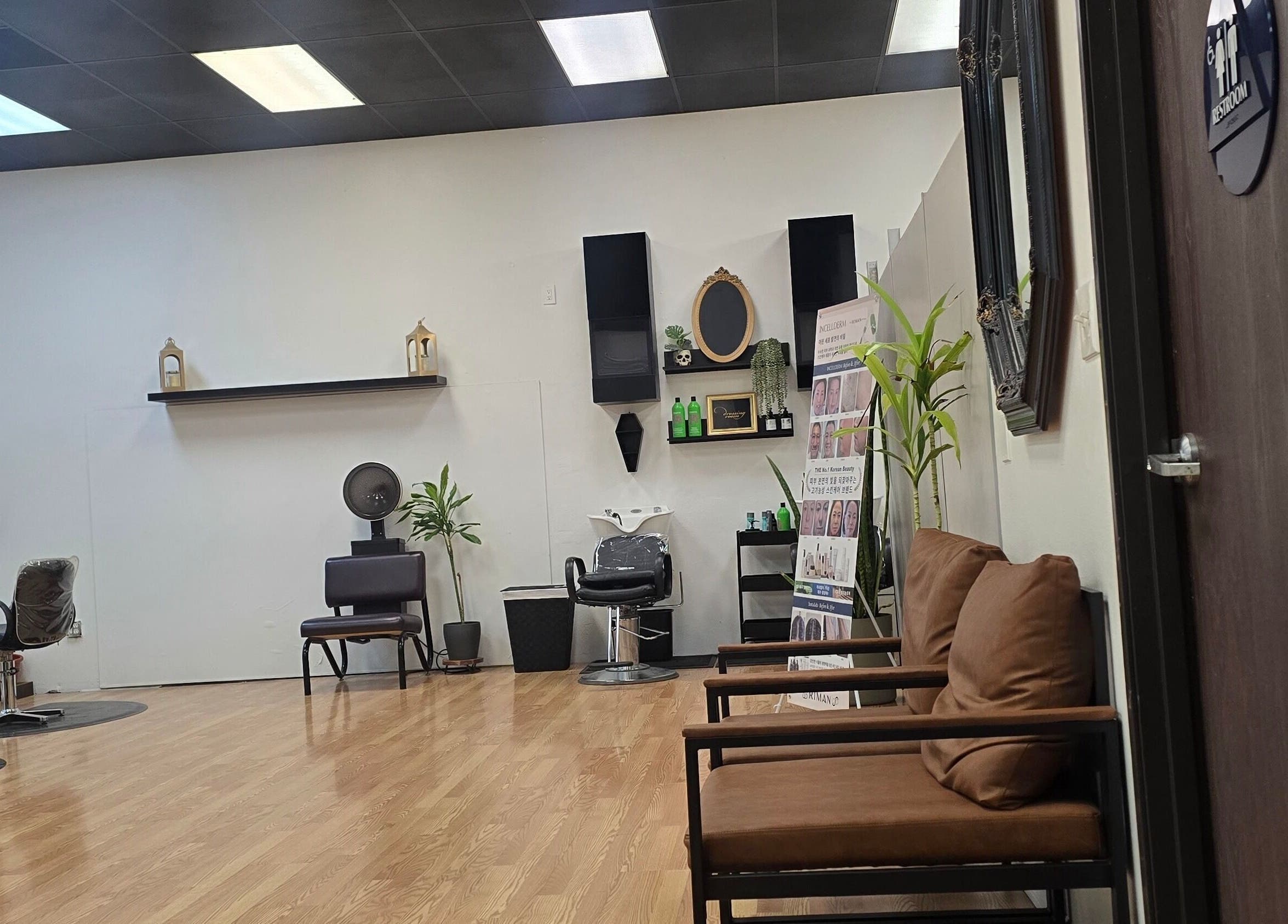 Chic and modern interior of Crystal's Beauty Lab in Paramount, California, US showcasing spacious elegance.