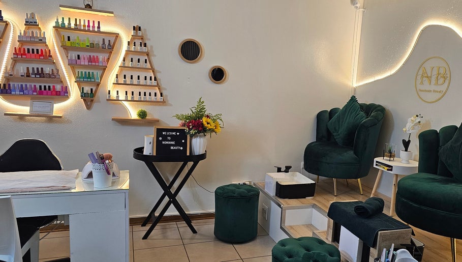 Elegant nail salon interior at Nominnie Beauty, Bloemfontein, Free State, ZA offering a tranquil atmosphere.