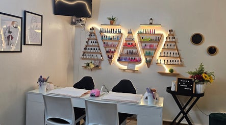 Nominnie Beauty nail station with colorful polish display in Bloemfontein, Free State, ZA.