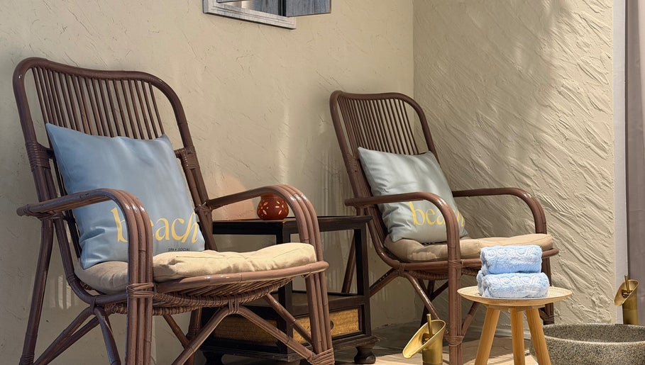 Cozy rattan chairs with plush pillows at Beach Spa Social, Kuala Lumpur, Wilayah Persekutuan Kuala Lumpur, MY.