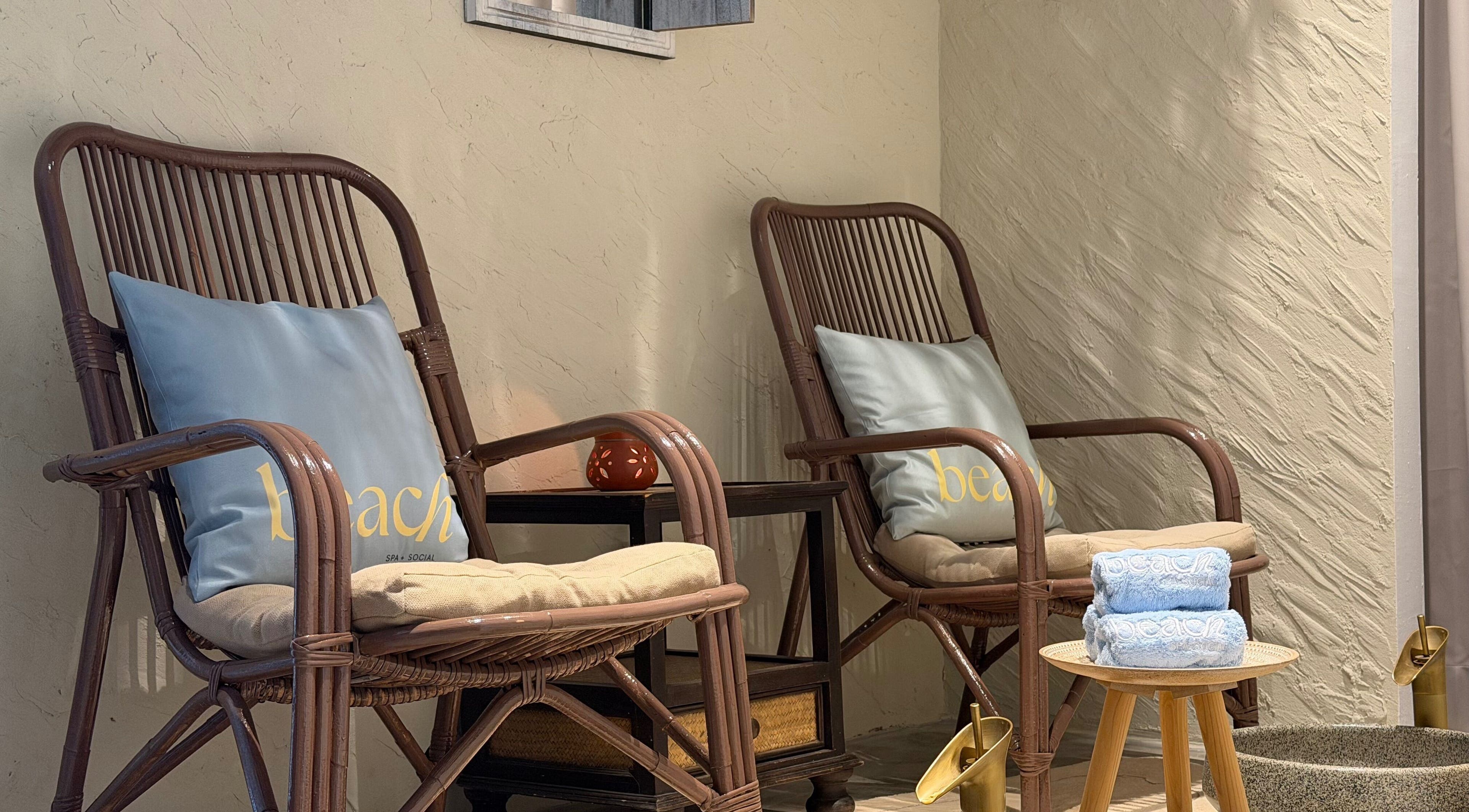 Cozy rattan chairs with plush pillows at Beach Spa Social, Kuala Lumpur, Wilayah Persekutuan Kuala Lumpur, MY.