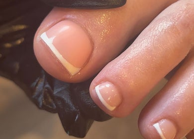 French pedicure at Polished by Asha in Haywards Heath, England, GB showing glossy and clean nails.