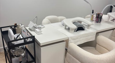 Modern nail care station at Polished by Asha in Haywards Heath, England, GB, featuring manicure tools and products.