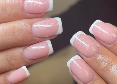 Elegant French manicure at Polished by Asha, Haywards Heath, England, GB.