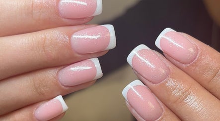 Elegant French manicure at Polished by Asha, Haywards Heath, England, GB.