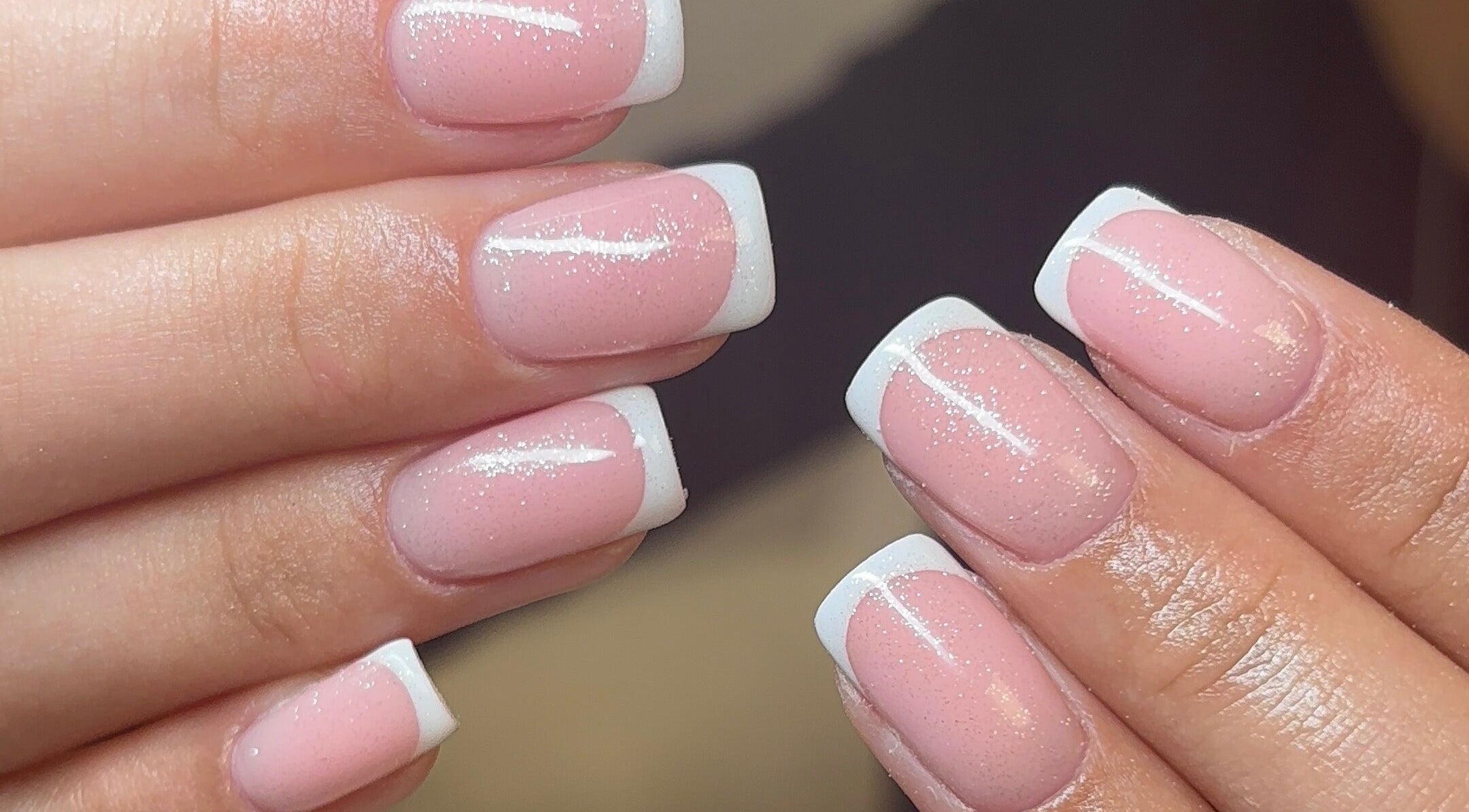 Elegant French manicure at Polished by Asha, Haywards Heath, England, GB.