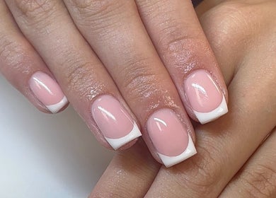 Close-up of elegant French manicure nails at Polished by Asha, Haywards Heath, England, GB.