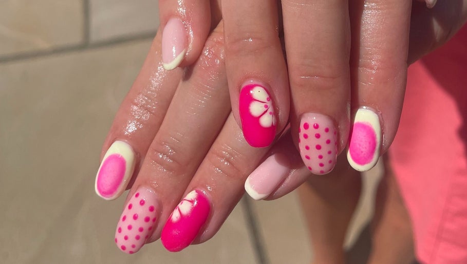 Colorful nail art at No10 Beauty & Aesthetics, Woodbridge, England, GB, showcasing intricate designs.