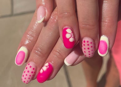 Colorful nail art at No10 Beauty & Aesthetics, Woodbridge, England, GB, showcasing intricate designs.