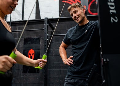 Fitness coaching session at Jnemzcoaching, Wellington, England, GB with coach guiding a client.