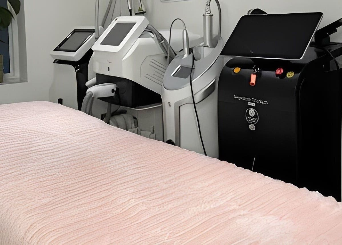 Modern treatment room at Dotyk Beauty Therapy, London, England, GB, featuring advanced spa equipment.