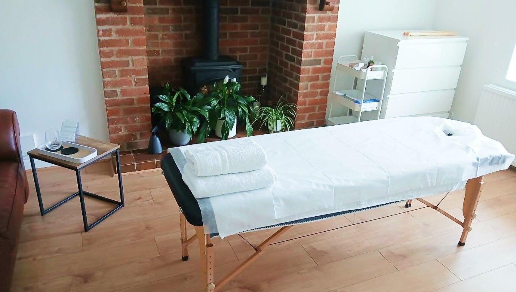 Massage table in serene setting at Facial Massage Aigul, Northampton, England, GB.