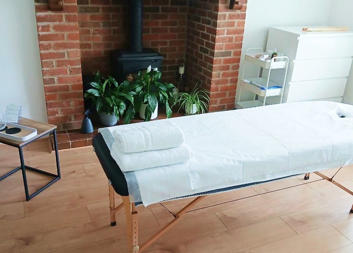 Massage table in serene setting at Facial Massage Aigul, Northampton, England, GB.