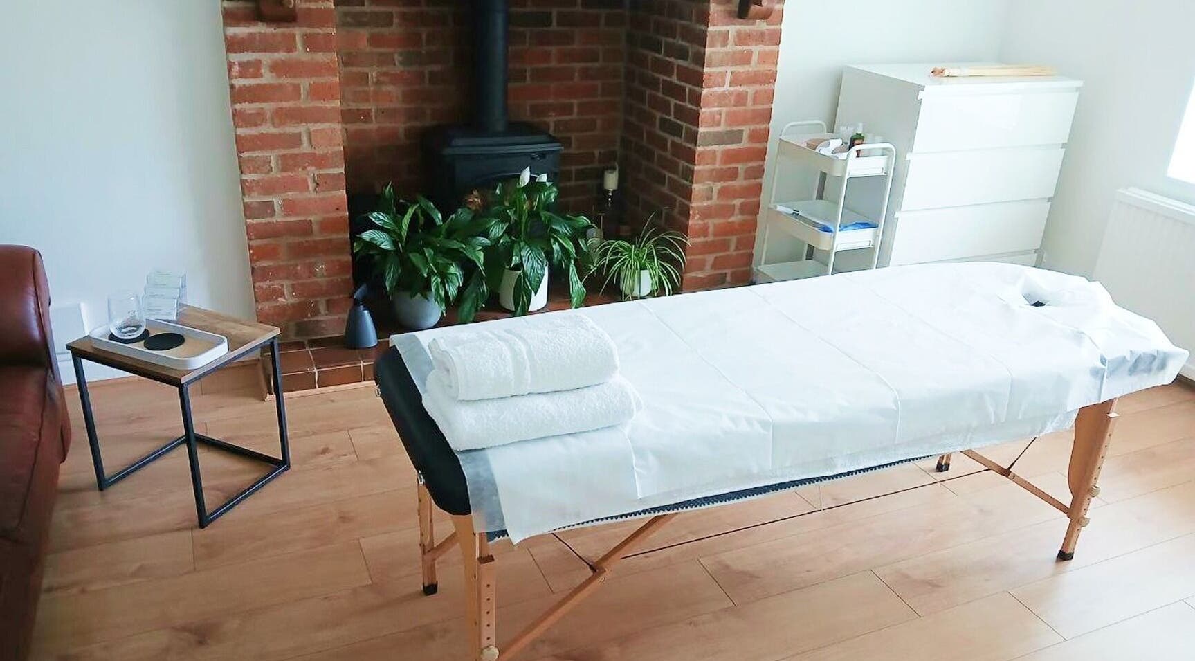 Massage table in serene setting at Facial Massage Aigul, Northampton, England, GB.