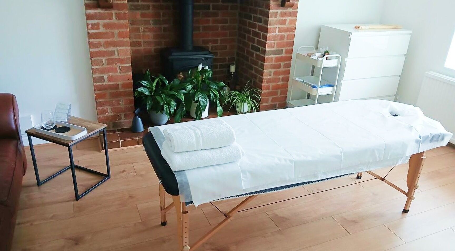 Massage table in serene setting at Facial Massage Aigul, Northampton, England, GB.