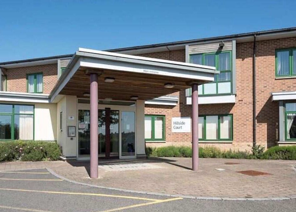 Modern entrance of Serene Glow by Charlotte Aimée, Bristol, England, GB, with sleek design.