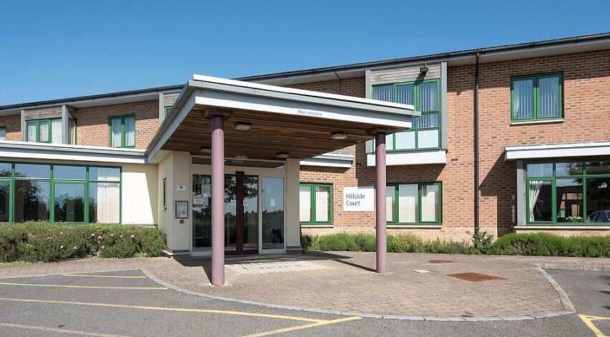 Modern entrance of Serene Glow by Charlotte Aimée, Bristol, England, GB, with sleek design.