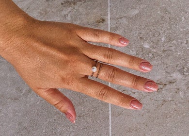 Glittery nude nails with ring at Nails by Megan Caroline, Ballymena, Northern Ireland, GB.