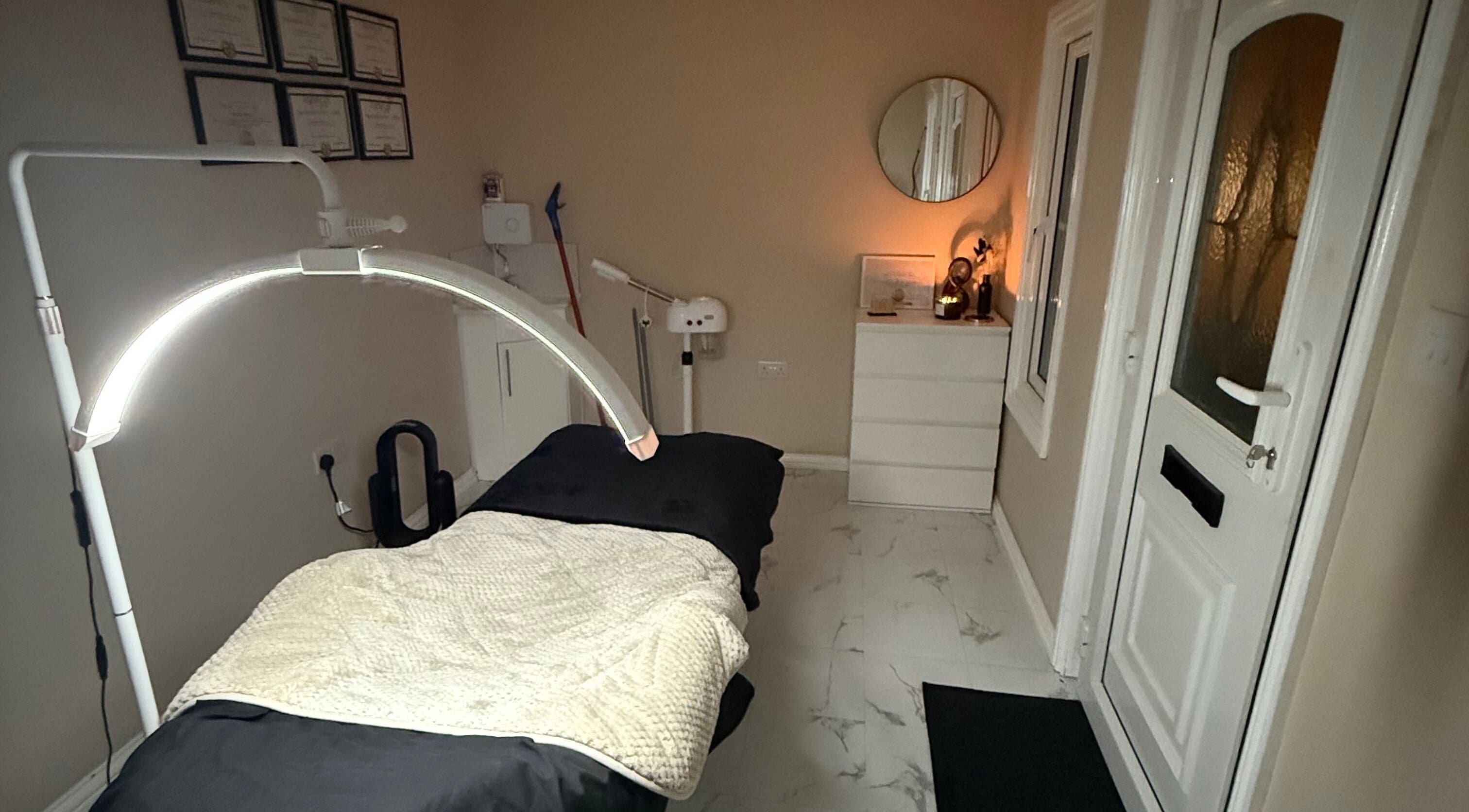 Cozy treatment room at ASM Beauty, Dudley, England for relaxation and wellness therapies.