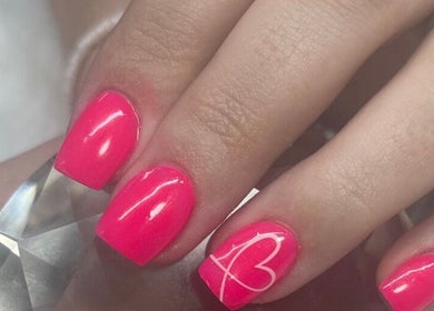 Bright pink nails with a heart design at Ella's Nails & Lash Studio Middelburg, Middelburg, Mpumalanga, ZA.