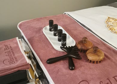 Spa essentials at Blissful Bay Inc., Schaumburg, Illinois, US. Relax with premium care products and massage tools.