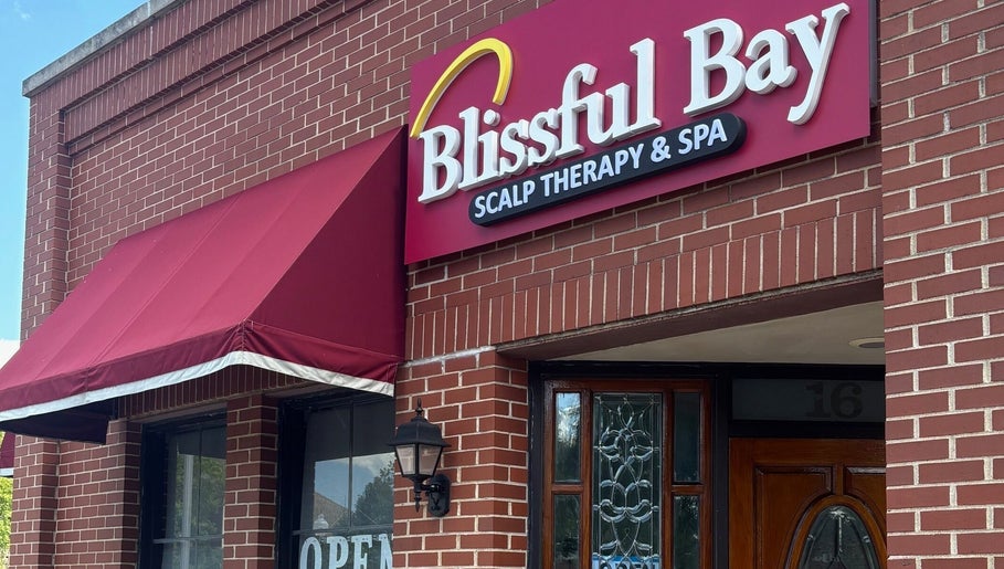Front view of Blissful Bay Inc. with red canopy in Schaumburg, Illinois, US.