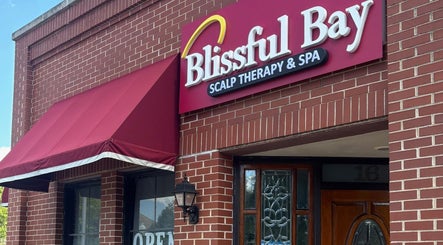 Front view of Blissful Bay Inc. with red canopy in Schaumburg, Illinois, US.