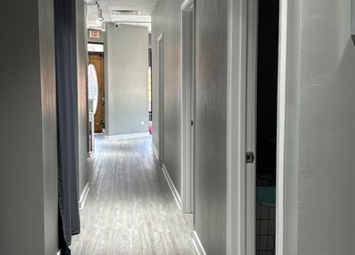 Peaceful hallway at Blissful Bay Inc. in Schaumburg, Illinois, US, featuring elegant decor.