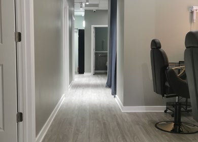 Modern hallway and salon chairs at Blissful Bay Inc., Schaumburg, Illinois, US offering wellness services.