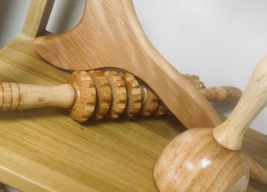 Elegant wooden massage tools at Lola & Bloom in Stanstead Abbotts, England, GB for ultimate relaxation.