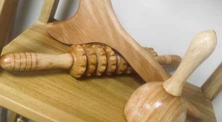 Elegant wooden massage tools at Lola & Bloom in Stanstead Abbotts, England, GB for ultimate relaxation.