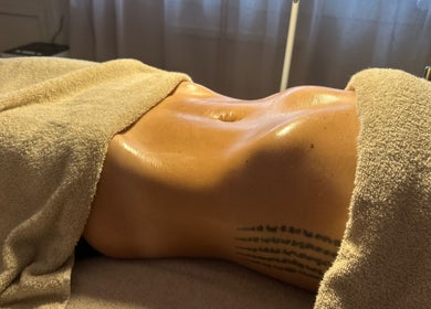 Relaxing body treatment at Lola & Bloom in Stanstead Abbotts, England, GB. Experience soothing wellness.