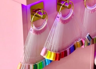 Colorful nail swatches displayed at Yummy Gels, North Shields, England, GB in a vibrant setup.