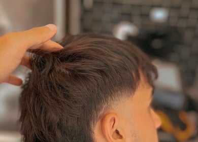 Close-up of a stylish haircut at Raustin, Córdoba, Córdoba, AR, showcasing expert grooming.