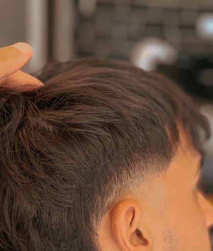 Close-up of a stylish haircut at Raustin, Córdoba, Córdoba, AR, showcasing expert grooming.