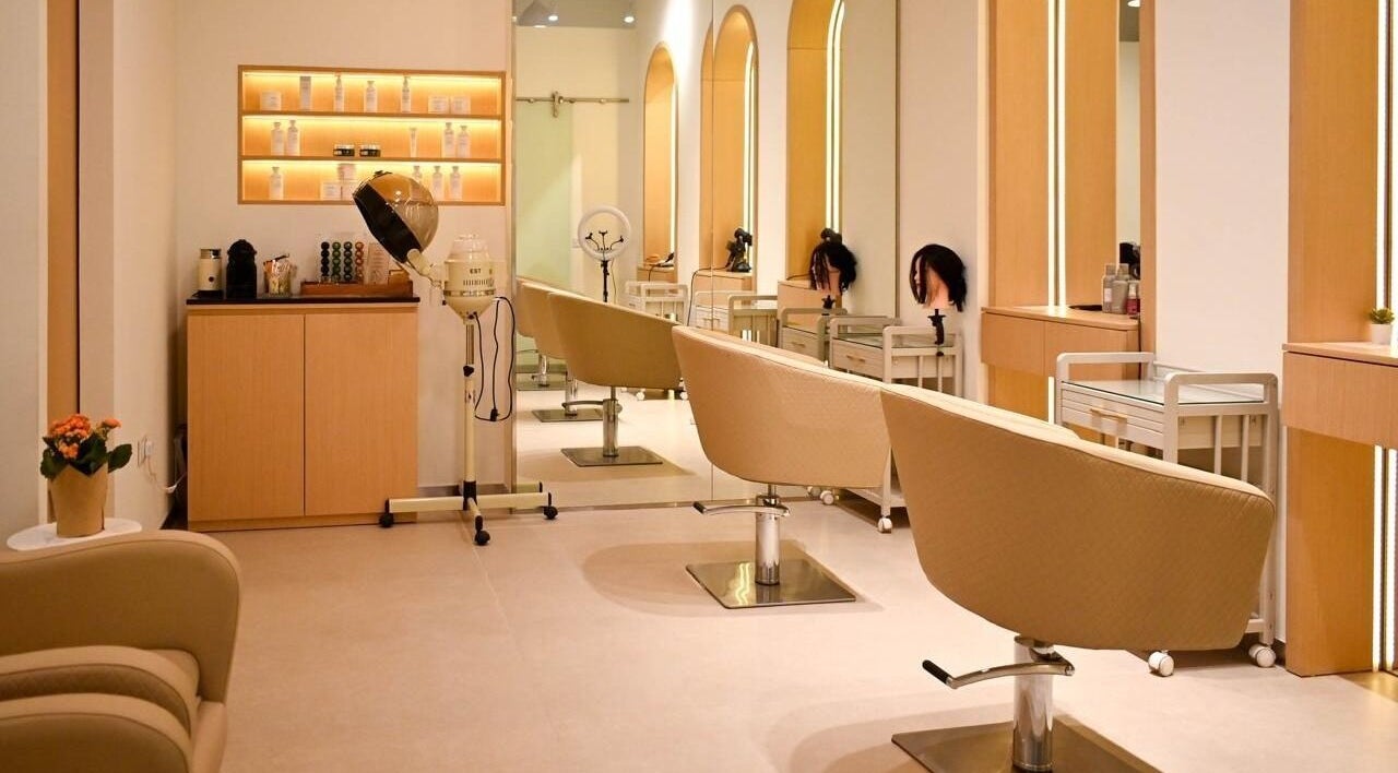 Chic and modern interior of Miss Keratin Beauty Salon, Dubai, AE, featuring stylish chairs and elegant decor.