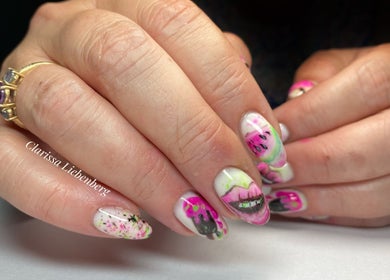 Creative nail art design at Blossom Beauty, Ladysmith, KwaZulu-Natal, ZA showcasing vibrant patterns.