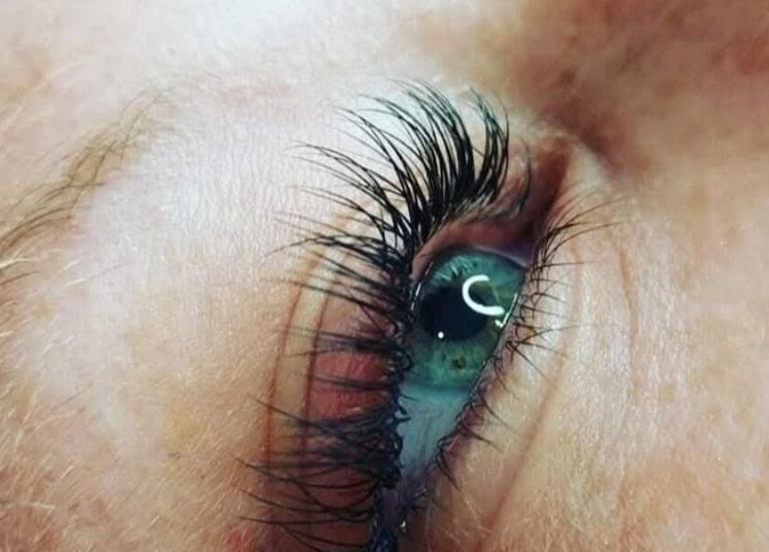 Lash enhancement at Elysian Beauty and Piercing in Sudbury, GB, showcasing detailed lash work.