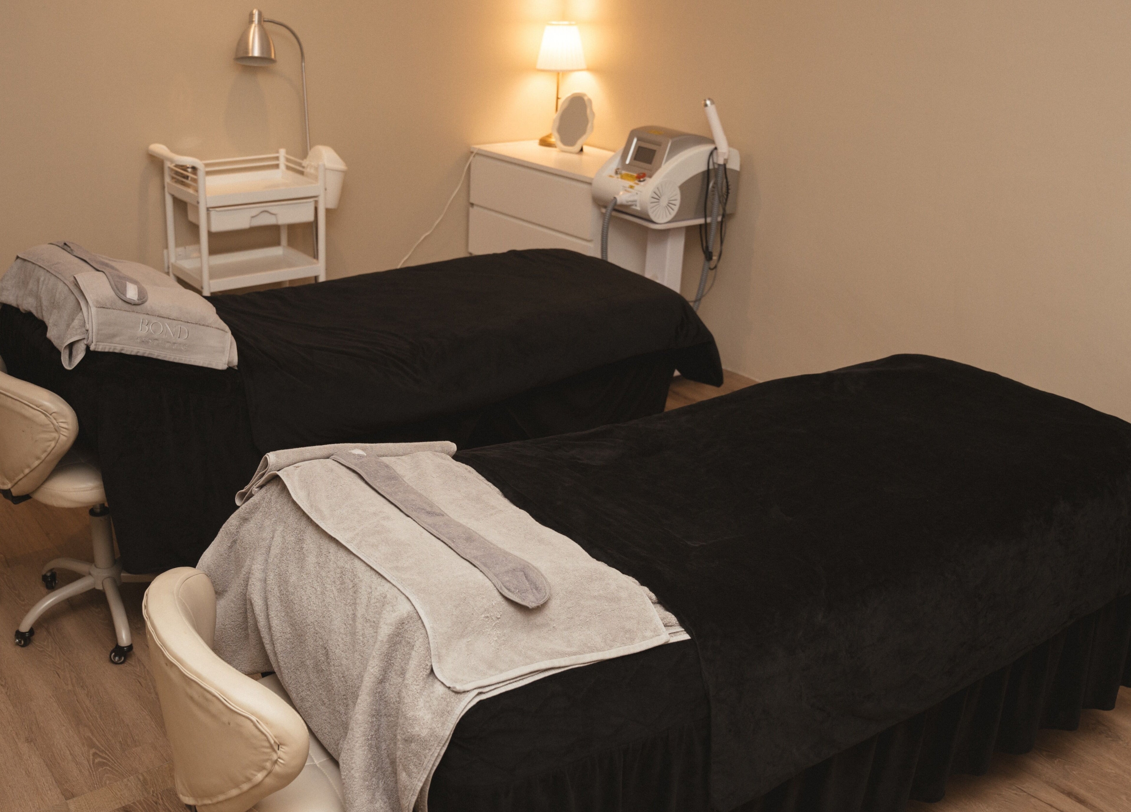Relaxing treatment room at Bond Aesthetic, Petaling Jaya, Selangor, MY, showcasing cozy massage beds.