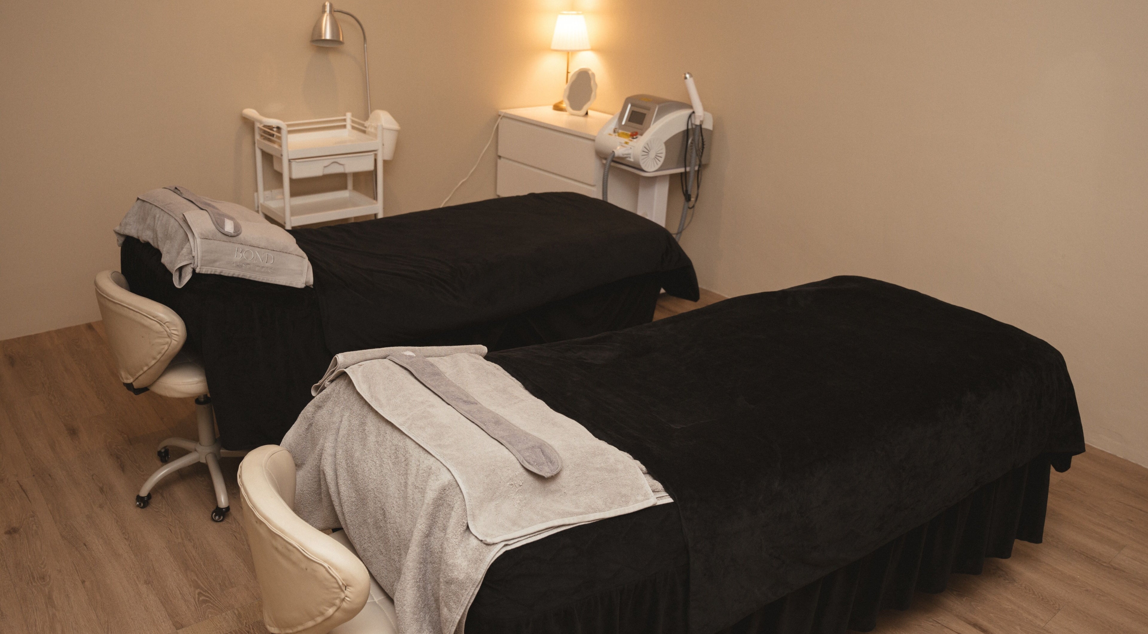 Relaxing treatment room at Bond Aesthetic, Petaling Jaya, Selangor, MY, showcasing cozy massage beds.