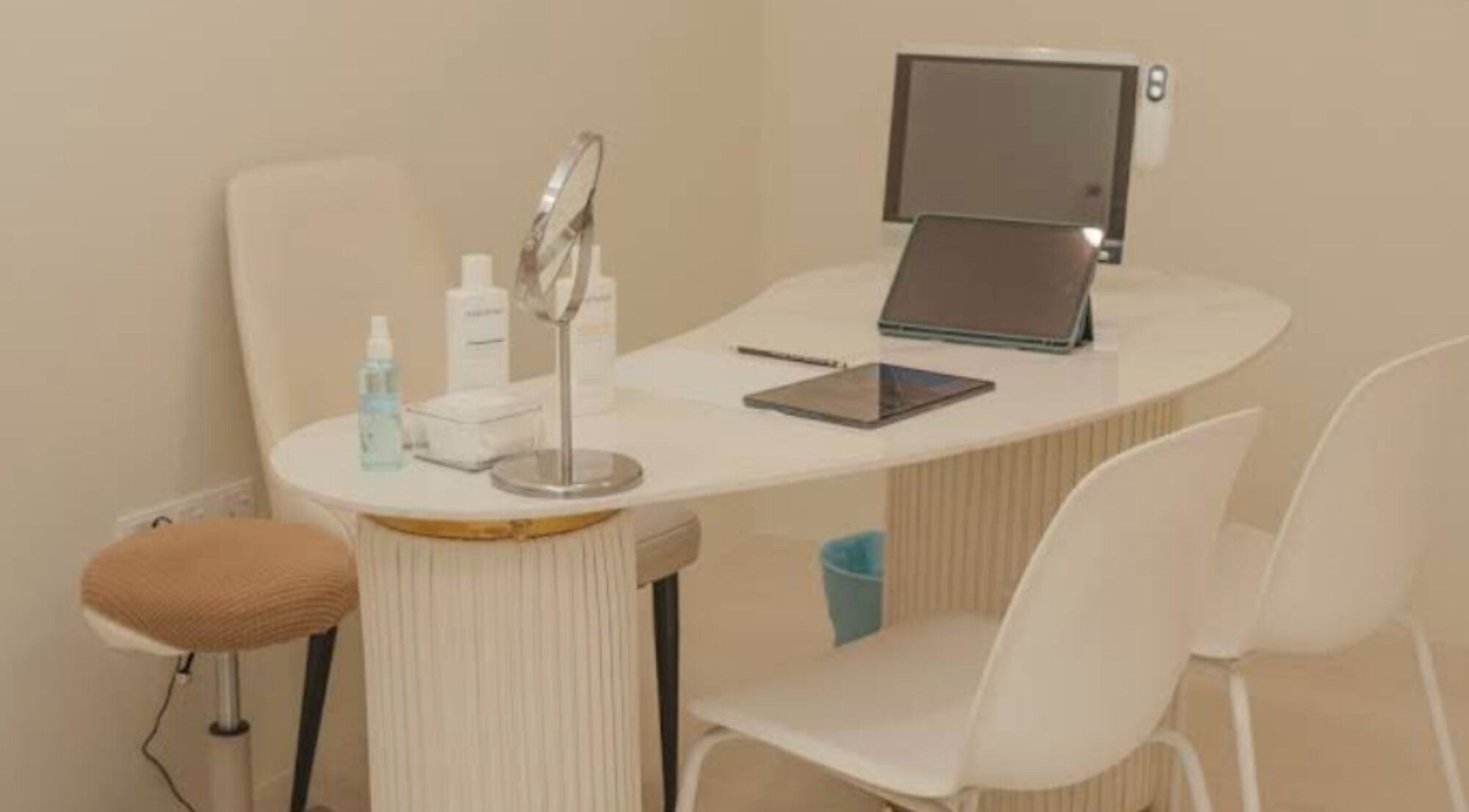 Elegant consultation desk at Bond Aesthetic, Petaling Jaya, Selangor, MY, featuring modern decor.