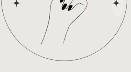 Elegant nail art illustration for NAILED IT NAILS in Markham, Ontario, CA, showcasing sleek black nails.